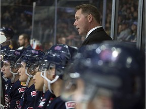 Regina Pats head coach Dave Struch behind the bench at the Brandt Centre.