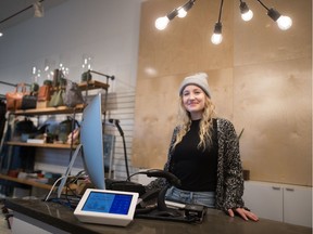 Coda and Cade owner Chelsea Petterson stands in the clothing store on Albert Street. Petterson tries to create a unique sales atmosphere in the store to encourage customers to shop at her brick and mortar business versus buying clothes online.