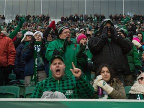 Saskatchewan Roughriders fans watched their team clinch first place in the CFL's West Division on Saturday by defeating the Edmonton Eskimos 23-13 at Mosaic Stadium on Saturday.