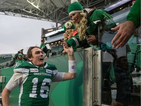 Isaac Harker celebrates after quarterbacking the Saskatchewan Roughriders to Saturday's 23-13 victory over the Edmonton Eskimos — a result that clinched first place in the West Division for Saskatchewan.