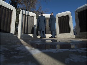 15 Wing Moose Jaw Chief warrant officer Bill Doman and colonel Ron Walker attend the annual Service of Remembrance for Public Servants held this week at the Legislative Building in Regina. The pair look at names on the Saskatchewan War Memorial, located on the Legislative grounds west of the Legislative Building. The memorial lists the names of Saskatchewan's fallen soldiers over the generations.