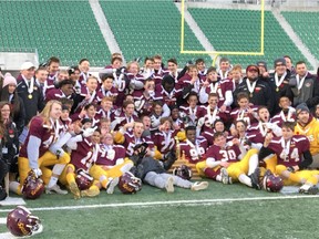 The LeBoldus Golden Suns celebrate Saturday after defeating the Saskatoon Holy Cross Crusaders 28-15 at Mosaic Stadium on Saturday to win the Saskatchewan High Schools Athletic Association's 6A football title.