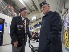 SASKATOON,SK--NOVEMBER 11/2019- World War 2 veterans Alan Scott, left, and Reg Harrison following the Remembrance Day Ceremony at SaskTel Centre in Saskatoon, SK on Monday, November 11, 2019.