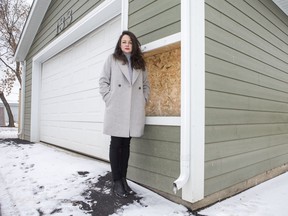 Sanctum Care Group executive director Katelyn Roberts in front of an opening cut for an Angel's Cradle where a baby could anonymously and safely be relinquished for care.