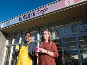 Katie Statler, right, community coordinator for Moose Jaw Families For Change, stands with client Jason Nanan, left, in front of the Kinsmen Cafe on 4th Avenue.