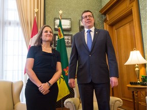 Canada's Deputy Prime Minister Chrystia Freeland, left, meets with Saskatchewan Premier Scott Moe in the Premier's office at the Saskatchewan Legislative Building.