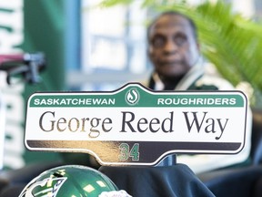 A mocked-up street sign sits on a table during a ceremony in honour of George Reed. Mosaic Stadium's new street address is now 1734 George Reed Way.