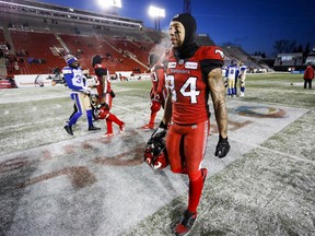 Calgary Stampeders receiver Reggie Begelton leaves the field in dejection after Sunday's 35-14 loss to the Winnipeg Blue Bombers in the CFL's West Division semi-final at McMahon Stadium.