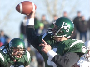 University of Saskatchewan Huskies quarterback Steve Bilan throws a pass during the 2004 playoffs against the Saint Mary's Huskies. Bilan played in the game despite an oblique injury.