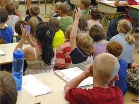 Grade 1 and 2 students at Henry Janzen School in a 2011 file photo.
