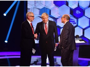 In this handout image provided by the BBC, UK Prime Minister Boris Johnson and Labour Party leader Jeremy Corbyn go head to head in the BBC prime ministerial debate hosted by British journalist and presenter Nick Robinson at Maidstone Studios on December 06, 2019 in Maidstone, Kent, England. Prime Minister Boris Johnson of the Conservative Party and Labour Party leader Jeremy Corbyn faced off in the final televised debate ahead of the country's December 12th general election.