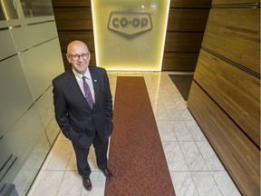 Federated Co-Op Limited CEO Scott Banda stands for a photograph in a hallway near his office in Saskatoon on October 2, 2018.