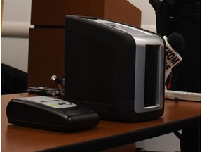 Saskatoon Police Service Staff Sergeant Patrick Barbar demonstrates how to use the new Draegar DrugTest 5000 device at the police station in Saskatoon on Jan. 24, 2018.