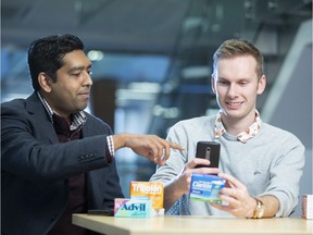Researchers Debajyoti Mondal (left) and Alexander Magnus designed an app for "translating" medicine labels.