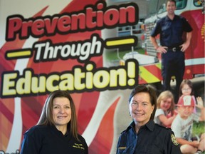 Candace Giblett, left, and Angela Prawzick, public education officers with Regina Fire & Protective Services, pose for a photo at Fire Hall No. 4.