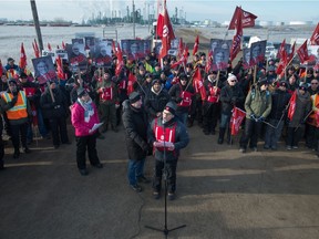 Kevin Bittman, centre, president of Unifor 594, speaks during a Unifor union rally near the Co-op refinery on the north side of Regina, Saskatchewan on December 6, 2019.