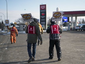 Locked-out workers from Regina's Co-op Refinery Complex picket at the Co-op fuel station of the corner of Park Street and Dewdney Avenue in Regina