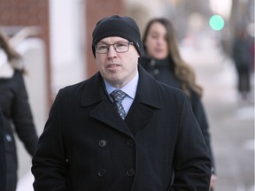 Regina Police Service officer Cpl. Colin Magee arrives to Provincial Court in Regina on Dec. 18, 2019.