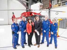 Flight nurse Jenny Thorpe, pilot Mike Duclos, Major Fund Development Officer Tammy Beauregard, SJHL President Bill Chow, pilot Graham Mackay and flight paramedic Matthew Hogan (left to right) stand in front of one of STARS' air ambulance helicopters. STARS and the Saskatchewan Junior Hockey League announced new initiative that will enlist community support to help raise funds for STARSÕ fleet renewal efforts. Photo taken in Saskatoon, SK on Friday, December 20, 2019.