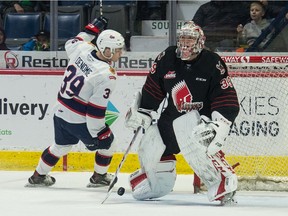 Carson Denomie of the Regina Pats celebrates after beating Moose Jaw Warriors goaltender Adam Evanoff WHL action at the Brandt Centre on Saturday.