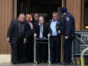 In this file photo taken on December 11, 2019 Harvey Weinstein leaves Manhattan Criminal Court, using a walker, following a hearing in New York. - Disgraced Hollywood mogul Harvey Weinstein has complained that the world has forgotten how he "pioneered" casting women prominently in his films, following dozens of sex-crime allegations that left him feeling "eviscerated."