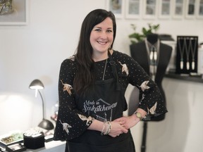 Megan Hazel poses for a photo in her Regina studio and store.