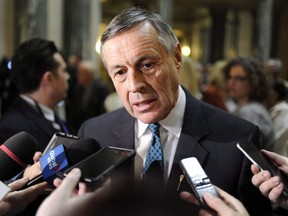 Saskatchewan's Minister of Justice says an announcement will be coming about the future of independent police oversight in the province. Saskatchewan's deputy premier Don Morgan speaks to reporters following the speech from the throne at the Legislative Building in Regina, Wednesday, Oct. 25, 2017.