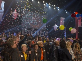 Participants cheer after the final numbers are shown for the Telemiracle 43 at TCU Place in Saskatoon on March 3, 2019.