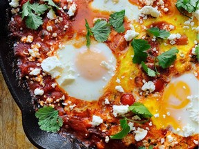 Baked eggs in spicy tomato sauce (photo by Renee Kohlman) (for Saskatoon StarPhoenix Bridges food column, Jan. 17, 2019)