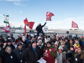 People gather for a rally on the Unifor picket line at the Co-op Refinery Complex in Regina, Saskatchewan on Jan 21, 2020.