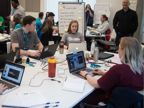 People work at the 24 Hour Startup competition held by Cultivator at the University of Regina's college avenue campus in Regina, Saskatchewan on Jan. 25, 2020.