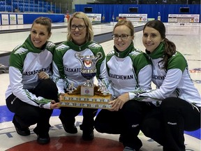 The Robyn Silvernagle team celebrates after winning the provincial Scotties Tournament of Hearts on Tuesday in Melville. Shown from left to right are Silvernagle (skip), Stefanie Lawton (third), Jessie Hunkin (second) and Kara Thevenot (lead).