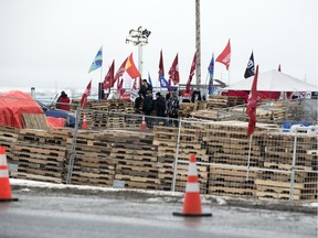 Wooden pallets have been added to the fence line of the locked out Unifor 594 employees at the Co-op Refinery Complex in Regina on Wednesday, January 29, 2020.