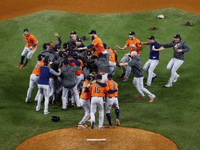 Columnist Rob Vanstone fielded some reader reaction after opining that the Houston Astros, shown celebrating their 2017 World Series victory, should be stripped of the title due to a sign-stealing scandal.