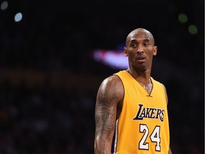 In this file photo taken on November 21, 2015 Kobe Bryant (24) of the Los Angeles Lakers looks on during the Lakers NBA match up with the Toronto Raptors,at Staples Center in Los Angeles, California. - According to multiple US media sources,  Kobe Bryant died in a helicopter crash in Calabasas, California on January 26, 2020. (Photo by Robyn BECK / AFP)