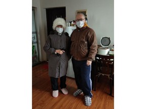 Wayne Duplessis, right, and his wife Emily Tjandra pose for a photo in their home in Wuhan, China in this handout photo. A Canadian teacher who has been living in China for about six years has some advice for those who want to evacuate from the epicentre of an outbreak of a new form of coronavirus. Don't. Wayne Duplessis, a teacher at Wuhan Optics Valley Weiming Experimental School, in Hubei province said he doesn't think it's wise.