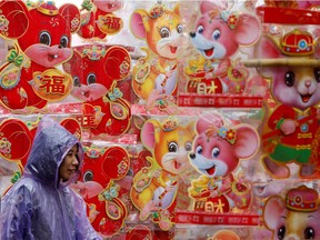 Rats themed decoration items hang for sale ahead of the Lunar New Year celebrations in Hanoi, Vietnam this month.