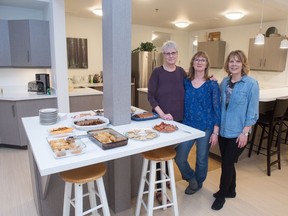 From left, Brenda MacLauchlan, Suzanne Sauder and Lois Adams stand in the community kitchen at Prairie Spruce Commons.