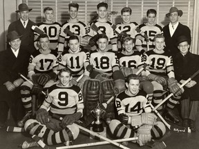 A group photo of the Saskatoon Bruins midget hockey team of 1943 with Gordie Howe, second from left, top row (number 13).