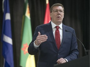 Premier Scott Moe addresses the SUMA convention at the Queensbury Centre in Regina on Monday, telling the audience that he expects police to uphold the law.