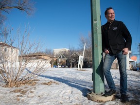 David Loblaw, owner of Chocolates by Bernard Callebaut, stands next to an empty lot on the corner of 13th Avenue and Retallack Street in Regina, Saskatchewan on Feb. 4, 2020. The future of the lot is a point of civic contention. Loblaw, whose business is near the empty lot, spoke to the newspaper about the history of the lot.