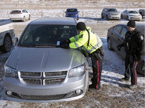 Members of the Regina Police Service were handing out parking tickets on the 1100 block of Fleet Street N. in Regina on Tuesday, February 4, 2020. The cars are parked directly across from gate 7 of the Co-op Refinery Complex where Unifor is blocking the entrance to the facility.