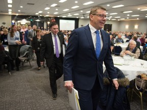 Saskatchewan Premier Scott Moe walks into the bear pit session with his cabinet in tow during the Municipalities of Saskatchewan (MOS) conference held at the Queensbury Convention Centre in Regina, Saskatchewan on Feb. 5, 2020.