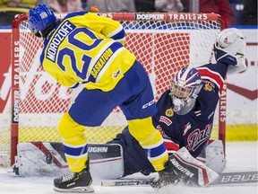 Regina Pats goaltender Donovan Buskey stops a penally shot from Saskatoon Blades forward Alex Morozoff during WHL action at SaskTel Centre in Saskatoon on Feb. 5, 2020.