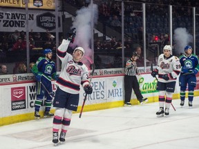 The Regina Pats' Riley Krane, left, celebrates after scoring a goal in Saturday's 6-2 WHL victory over the visiting Swift Current Broncos.