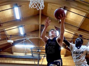 Josh Soifer of the Luther Lions, shown during the recent Luther Invitational Tournament, scored 45 points in a Regina Intercollegiate Basketball League senior boys game Monday. Counting league and LIT play, Soifer has 178 points over his last four games.