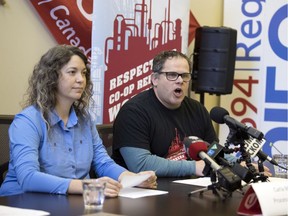 Carla McCrie, left, Coop Refinery Complex process operator, and Kevin Bittman, Unifor 594 president, provide a technical briefing on negotiations with Federated Co-operatives Limited (FCL), which locked out members of Unifor 594 on December 5, 2019.