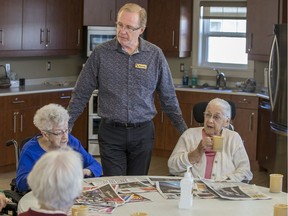 Randy Kurtz of Sunnyside Adventist Care Centre chats with residents on a sunny February morning. (Saskatoon StarPhoenix/Liam Richards)
