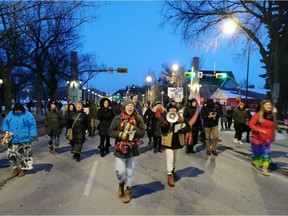 People march up Albert Street in solidarity with the Wet'suwet'en First Nation's pipeline protest on Saturday, Feb. 15.
