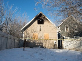 A fire damaged home stands on the 1300 block of Rae Street in Regina, Saskatchewan on Feb. 19, 2020.